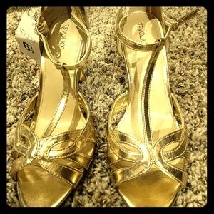 Gold T-strap heels